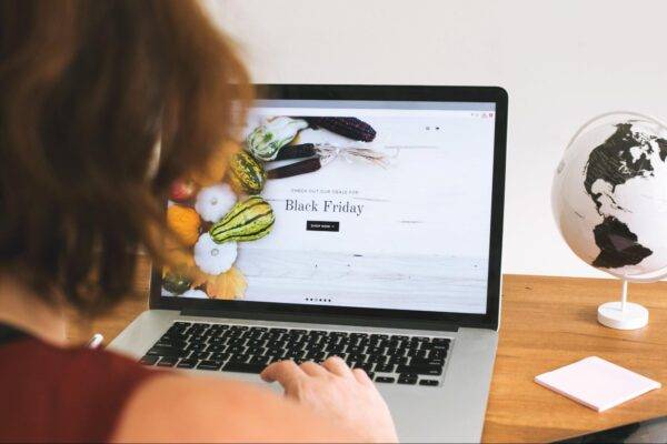 Woman browsing online sales for Black Friday