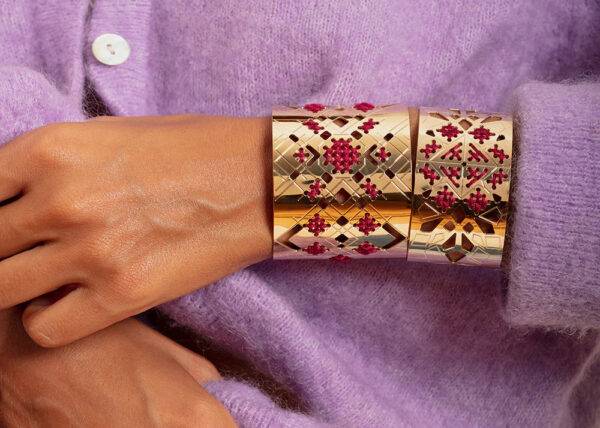 Close crop of a wrist modeling a cuff bracelet