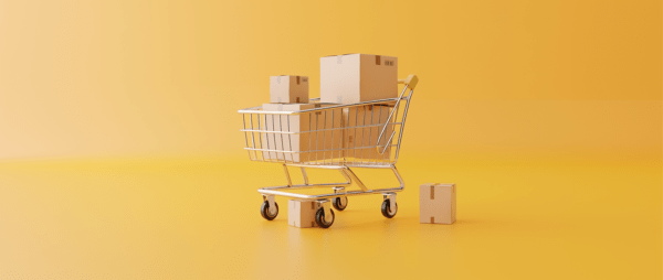 shopping cart overflowing boxes and boxes on the ground nearby: affiliate marketing apps