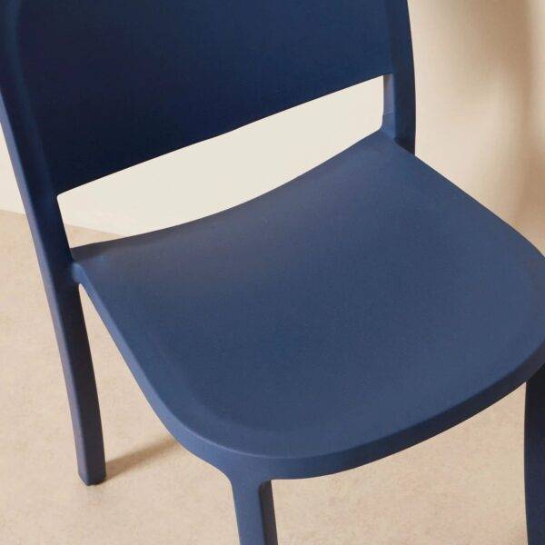 Detail of a product photo of a blue plastic chair