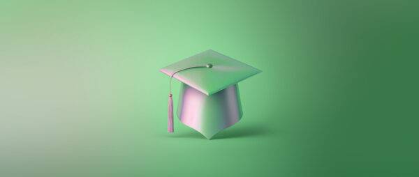 a graduation hat on a green background