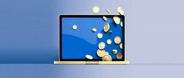 laptop with coins falling around it: how to make a website to sell stuff