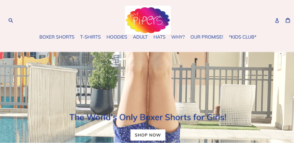 My Pipers website banner with a girl doing a handstand wearing a pair of blue shorts.